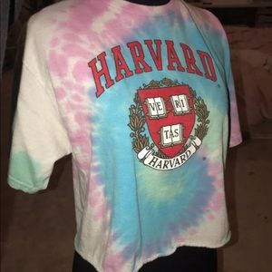 a tie dye harvard crop top